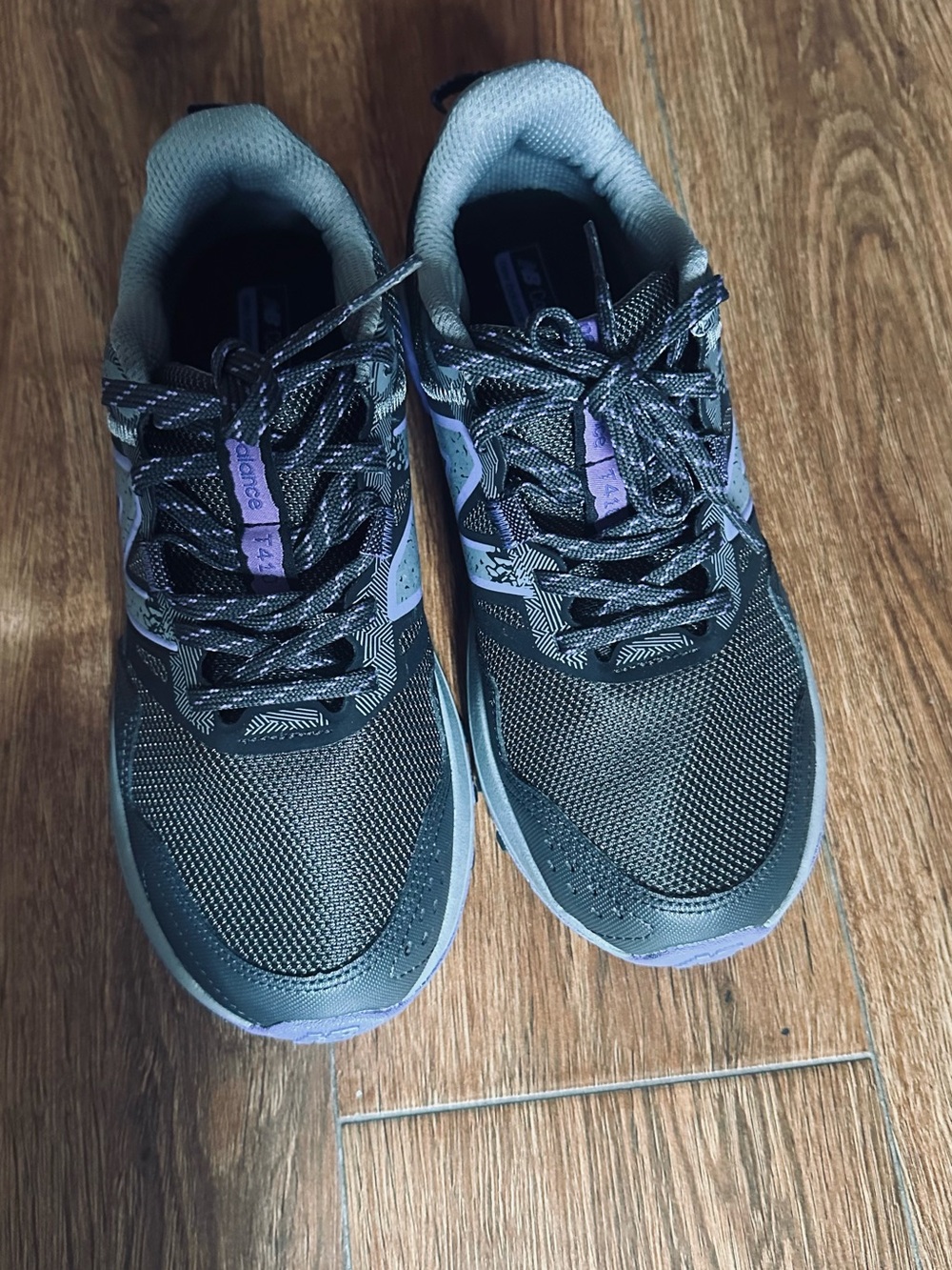 New Balance Black and Lavender Trail Running Shoes